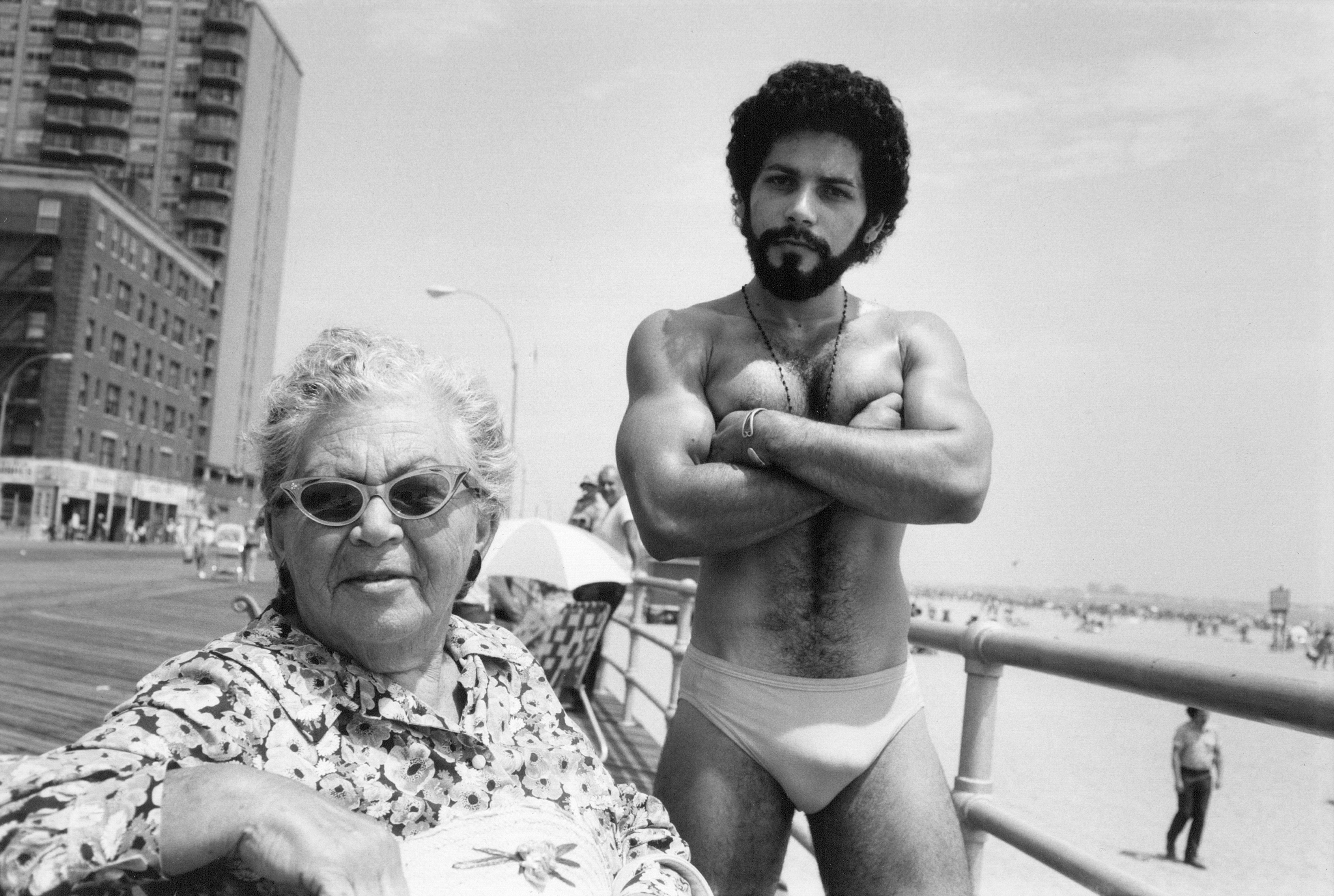 Arlene Gottfried, Angel and Woman on Broadwalk in Brighton Beach New York, 1976 © estate Gottfried